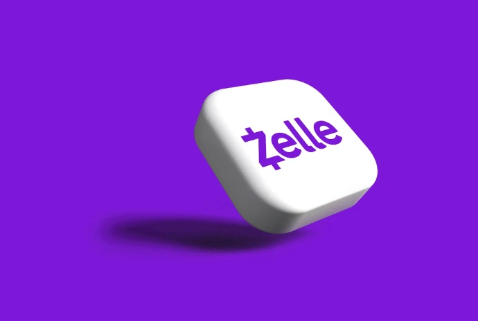 Zelle payment method a white dice with the word zelle on it