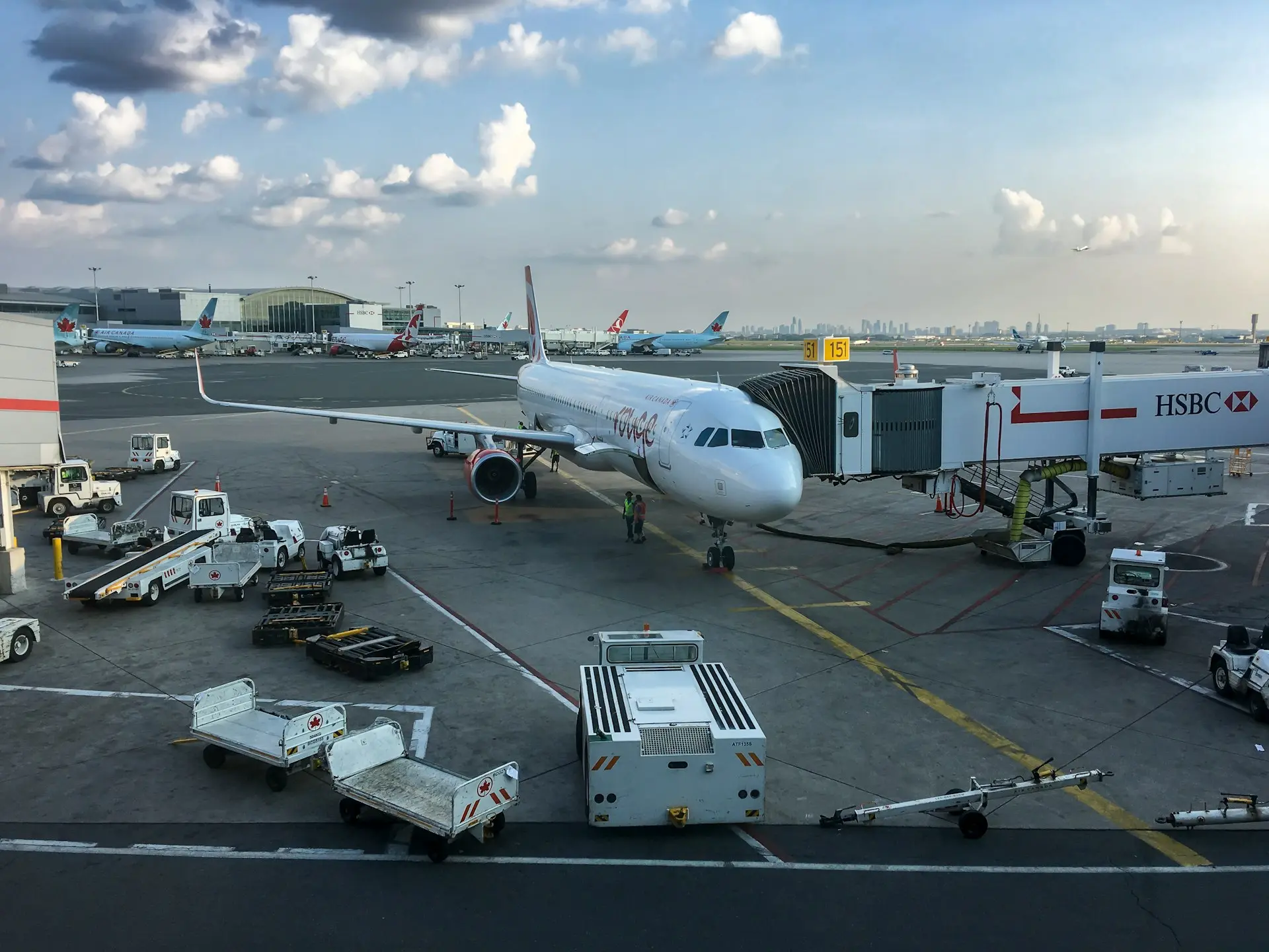 a large jetliner sitting on top of an airport tarmac